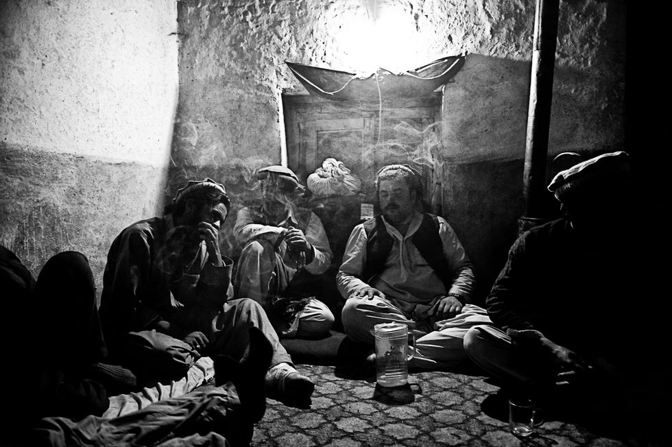 9 peoplesittingaroundheater