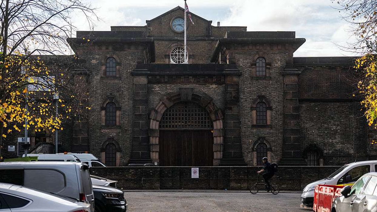 Man surrenders three days after mistaken release as manhunt continues