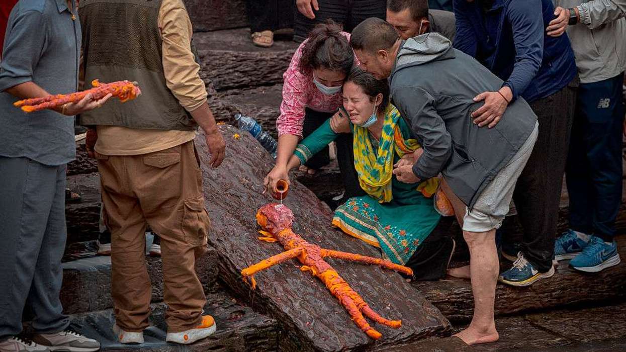 Nepal Floods: With little hope of finding their missing loved ones, families begin symbolic funerals