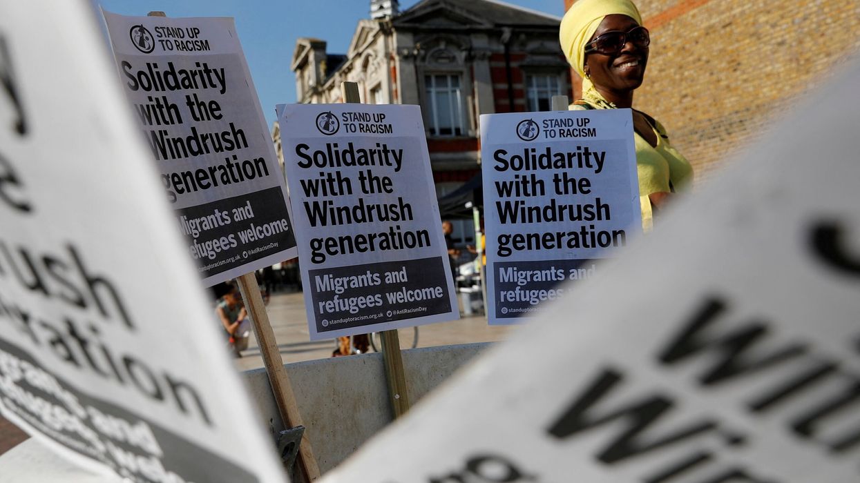 A woman attends an event in Windrush Square to show solidarity with the Windrush generation in the Brixton district of London on April 20, 2018. (Photo: Reuters)