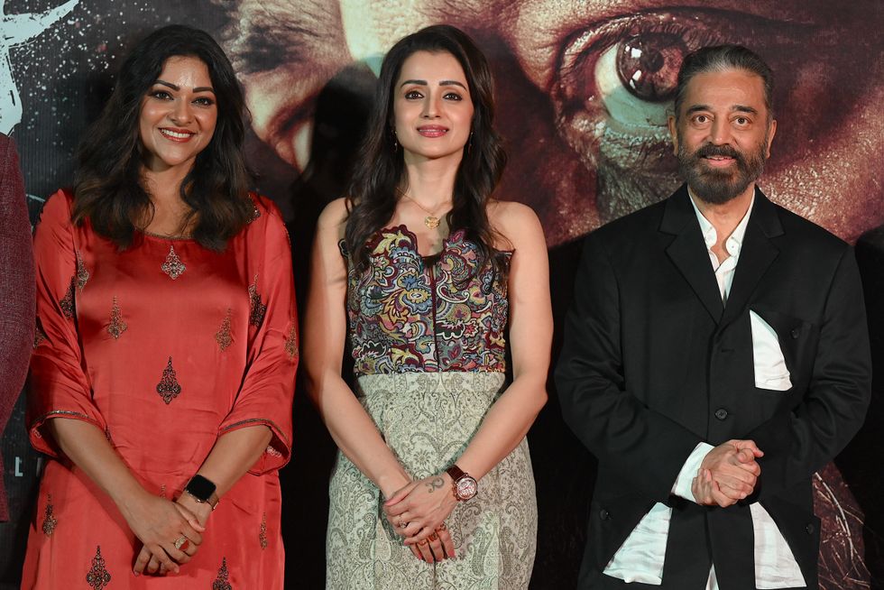 Abhirami, Trisha Krishnan and Kamal Haasan