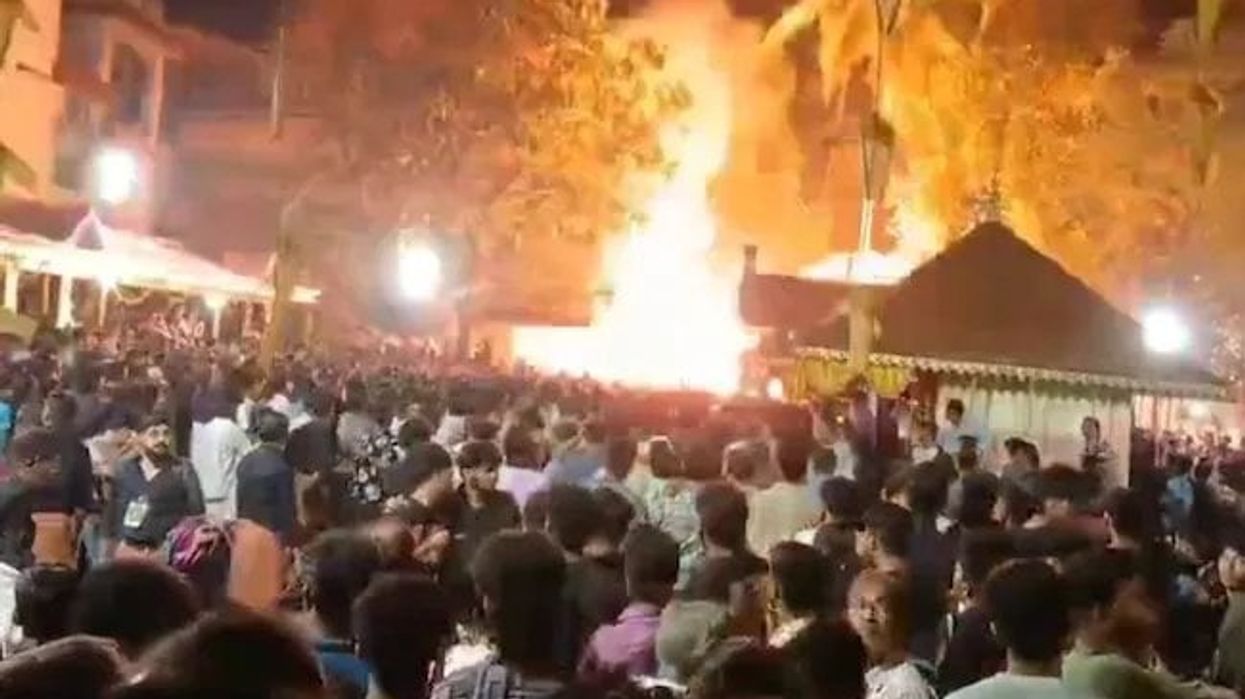 According to Indian media reports, officials stated that the flames left many in the tightly packed crowd with burns on their faces and hands. (Photo credit: Twitter)