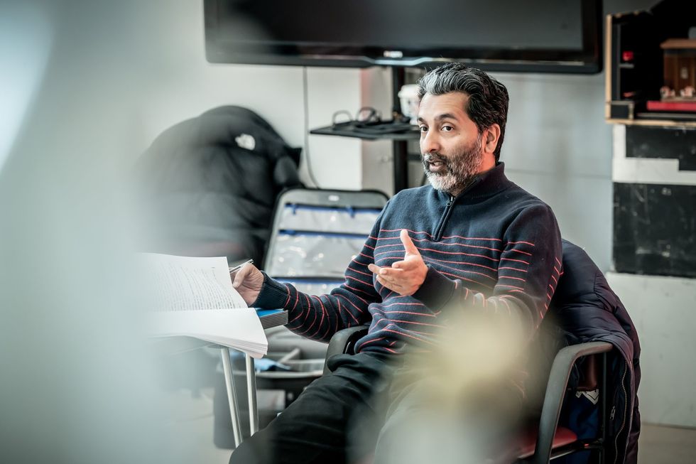 Amit Sharma director in rehearsal for Retrograde credit Marc Brenner