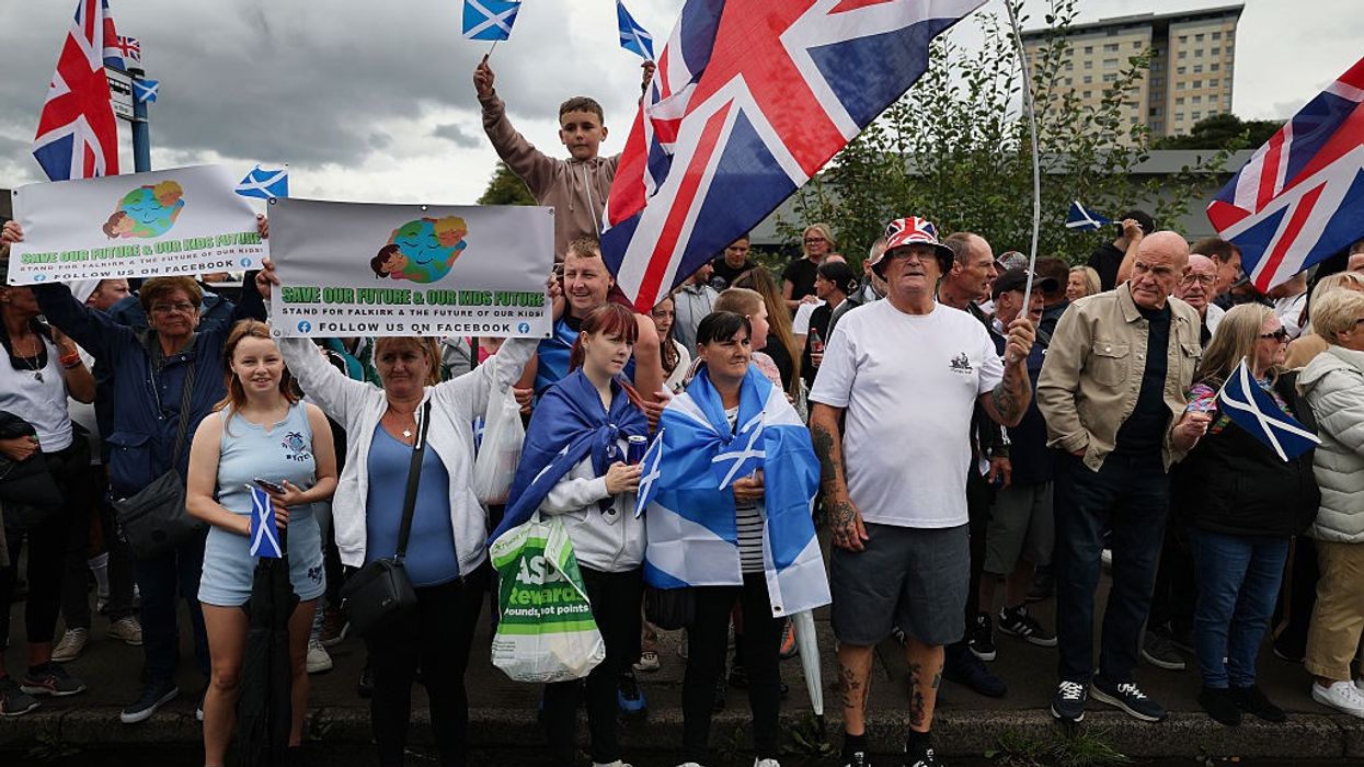 Police arrest five after anti-asylum protesters target Heathrow hotel