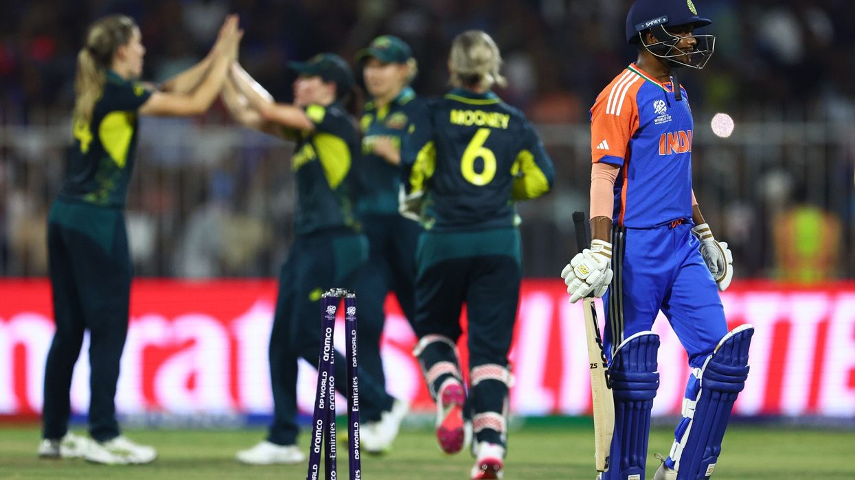Arundhati Reddy of India walks off after being run out by Phoebe Litchfield and Annabel Sutherland of Australia during the Women's T20 World Cup match at Sharjah, UAE, on October 13, 2024. (Photo: Getty Images)