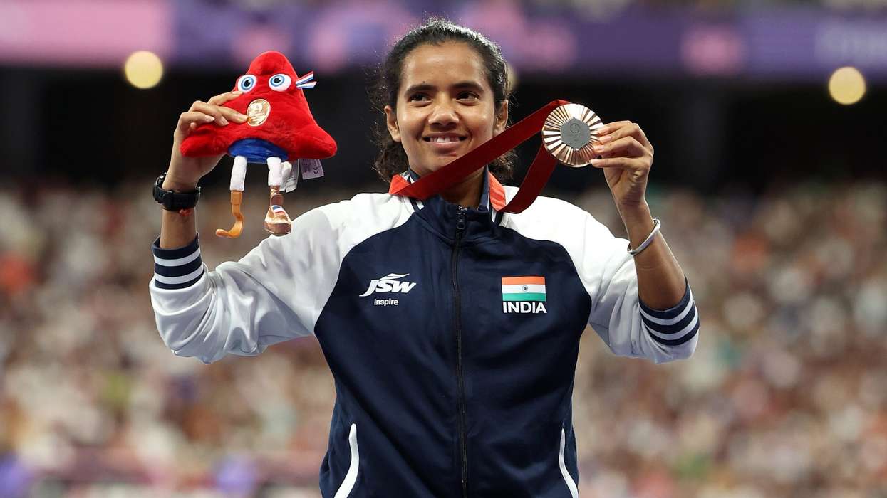 Bronze medalist Preethi Pal of Team India celebrates on the podium at the Para Athletics Women's 200m - T35 Medal ceremony on day four of the Paris 2024 Summer Paralympic Games. (Photo: Getty Images)