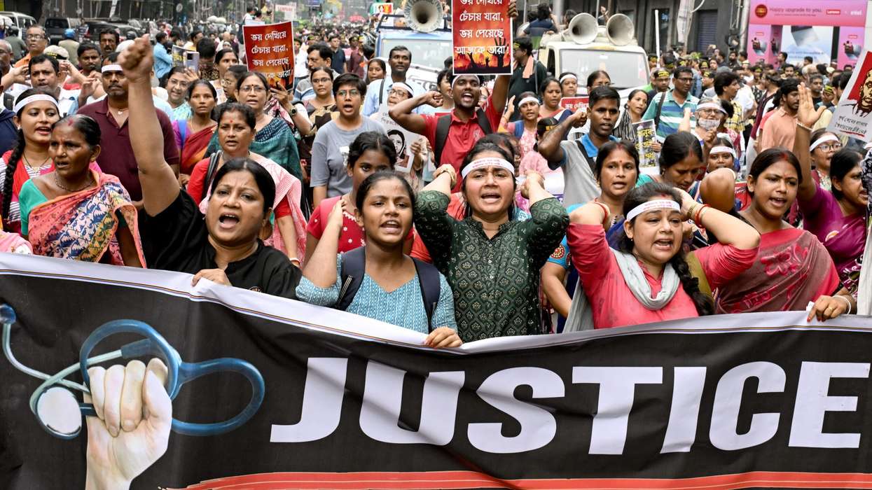 Doctors and social activists carrying a banner, shout slogans during a rally to condemn the rape and murder of a doctor in Kolkata, on October 2, 2024. (Photo: Getty Images)