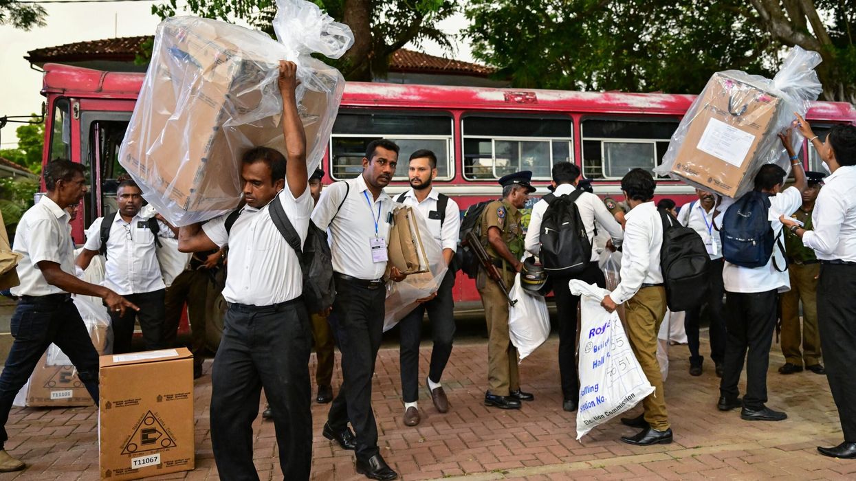 Election officials transport sealed ballot boxes to a counting centre at the end of voting in Sri Lanka's legislative elections in Colombo on November 14, 2024. (Photo: Getty Images)