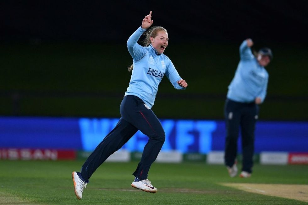England's Sophie Ecclestone celebrates the last wicket of South Africa's Trisha Chetty during the 2022 Women's Cricket World Cup second semi-final match between England and South Africa at Haley Oval in Christchurch on March 31, 2022.