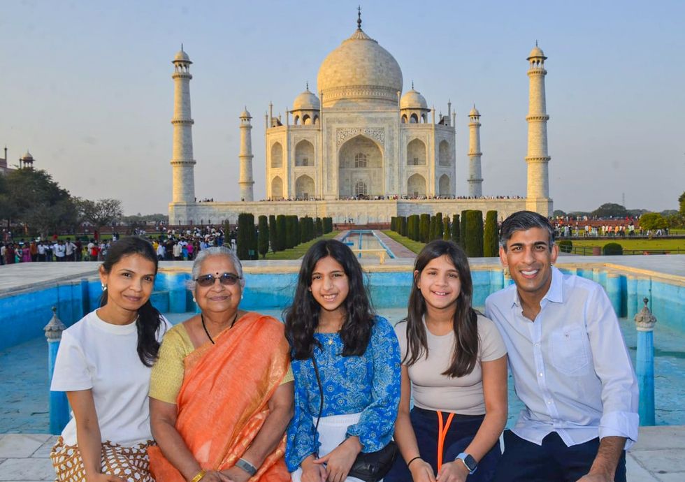 Former prime minister Rishi Sunak with his wife Akshata  Murty (left), their children Anoushka and Krishna and his mother-in-law Sudha Murty (second from left) are pictured during their visit to the Taj Mahal in Agra last month