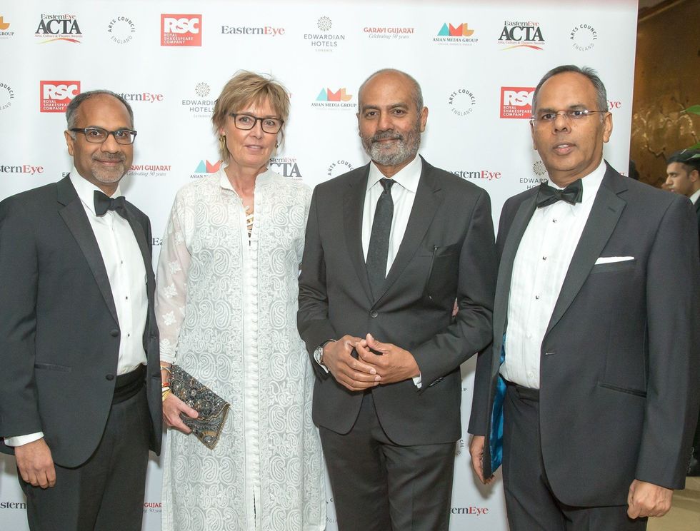 George Alagiah and his wife Frances with Shailesh Solanki L and Kalpesh Solanki at the Asian Business Awards