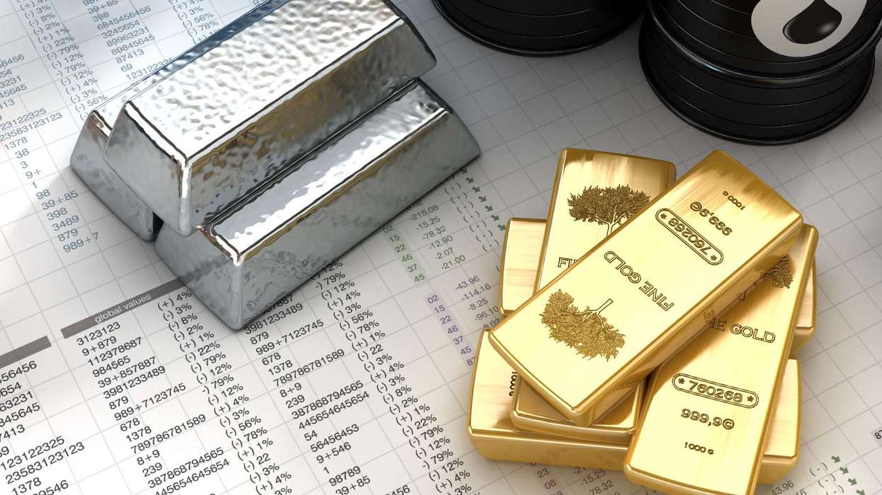 Gold, silver slide sharply from record highs