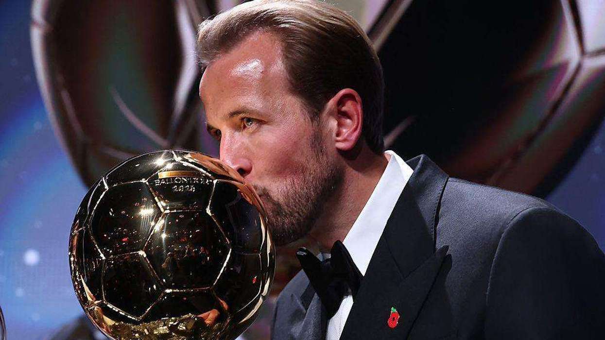 Harry Kane holds the 2026 Ballon d'Or trophy at the London Palladium