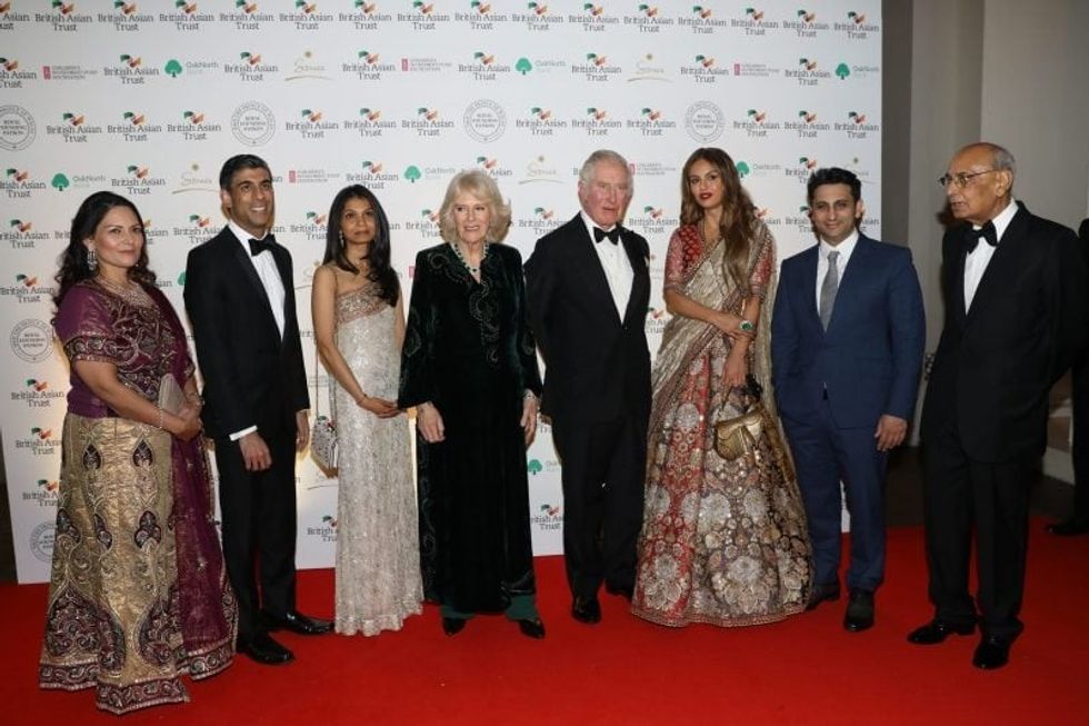 Home secretary Priti Patel, chancellor Rishi Sunak and his wife Akshata Murthy, Camilla, the Duchess of Cornwall, Prince Charles, the Prince of Wales, Natasha Poonawalla and Adar Poonawalla and Mian Mohammad Mansha at reception to celebrate the British Asian Trust at The British Museum
