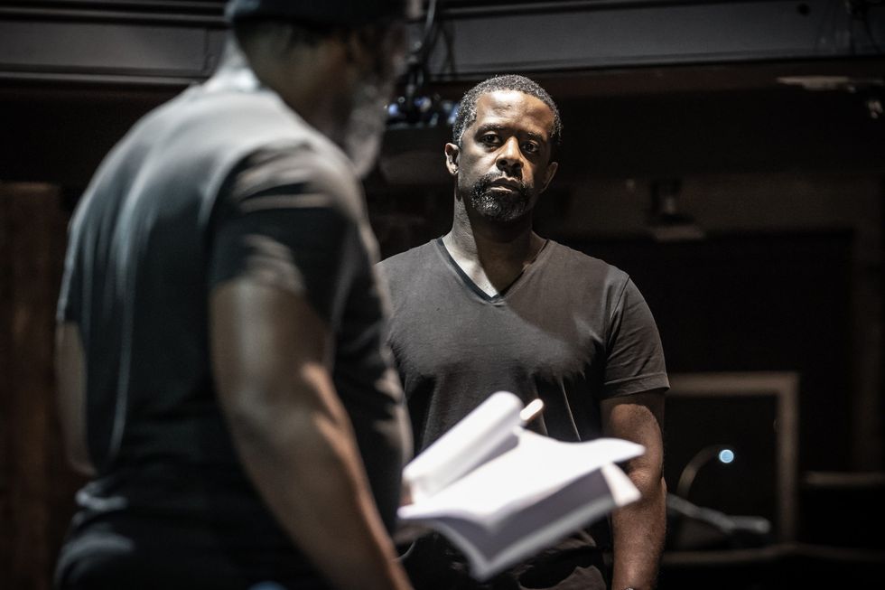 Hymn rehearsal photos. Danny Sapani left and Adrian Lester right. Credit Marc Brenner 2