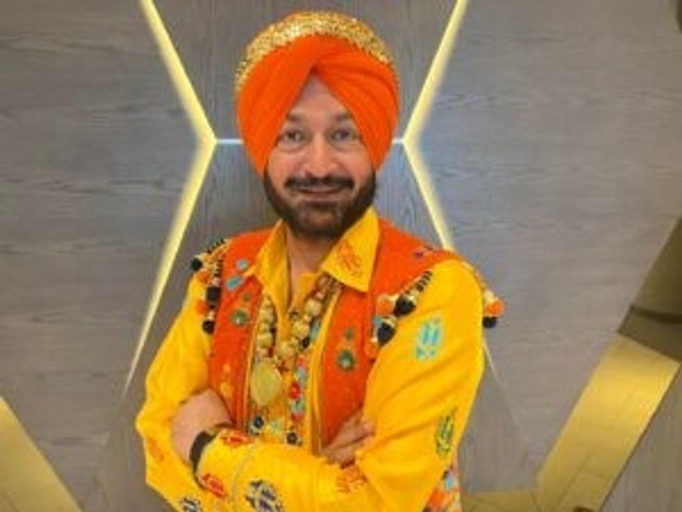 I Malkit Singh 047448125 n