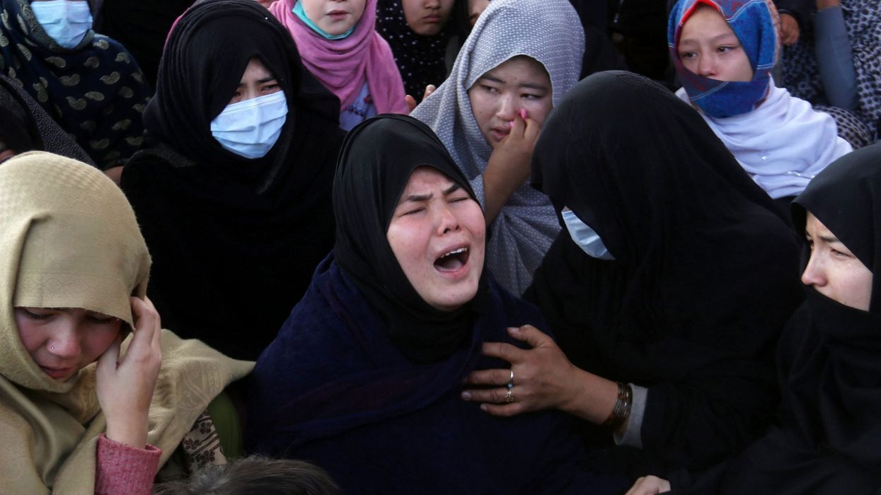 Shiites mourn miners killed in Pakistan attack claimed by Islamic State