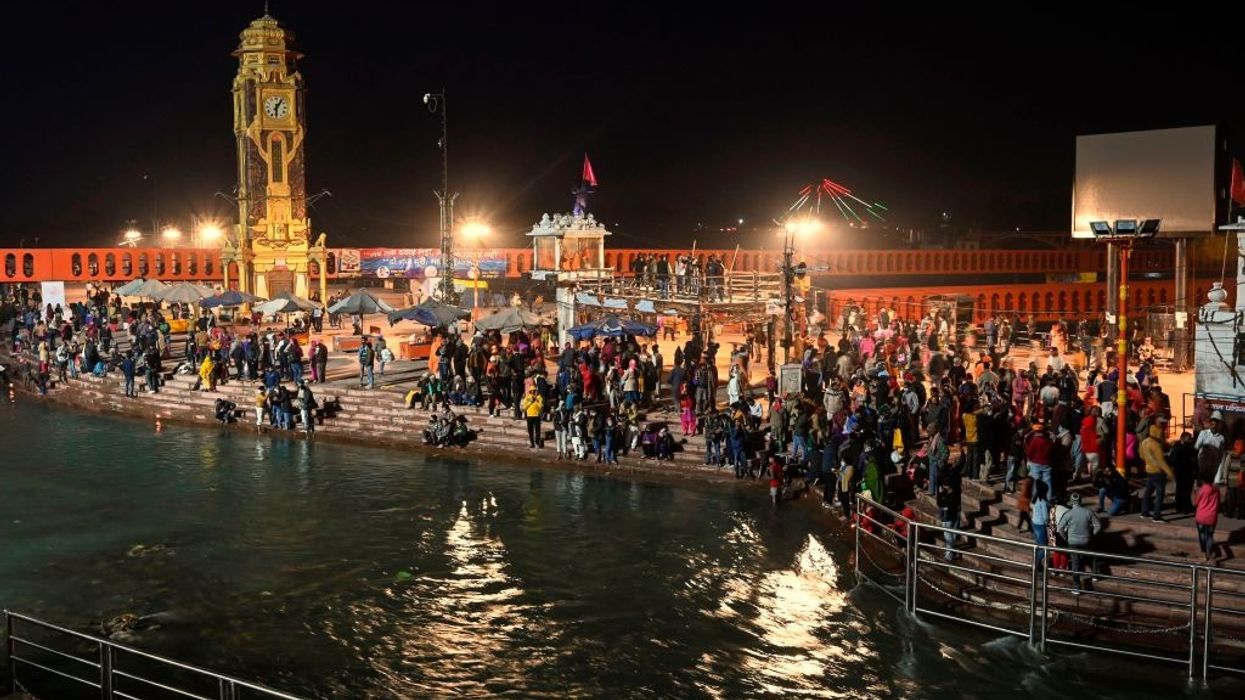 Pilgrims gather at River Ganga ahead of Kumbh Mela despite Covid-19 risk