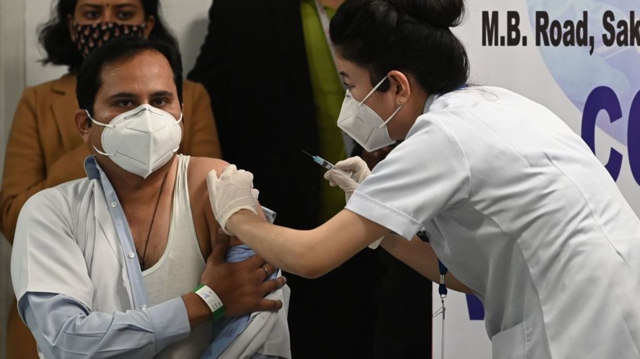 India's Modi claims a 'decisive victory' against Covid-19 as the country begins world's largest vaccination programme