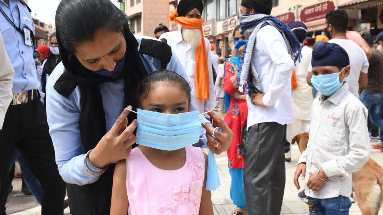 India's Covid-19 infections exceed 100,000 for the first time