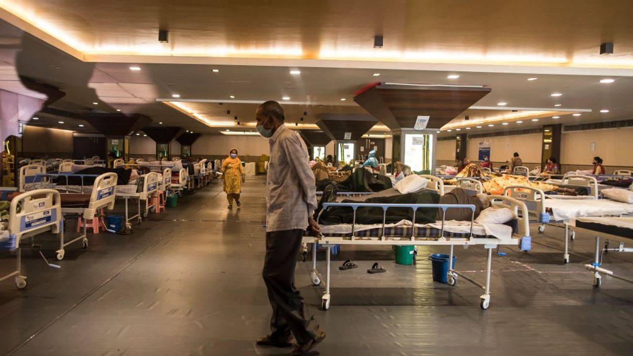 India extends record rise in Covid-19 cases; 217,353 new patients