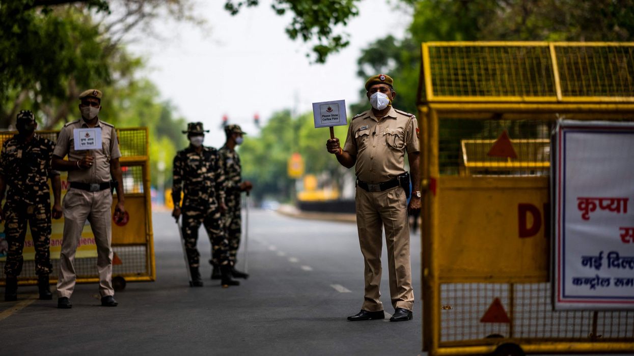 New Delhi extends coronavirus lockdown as India cases hit new record