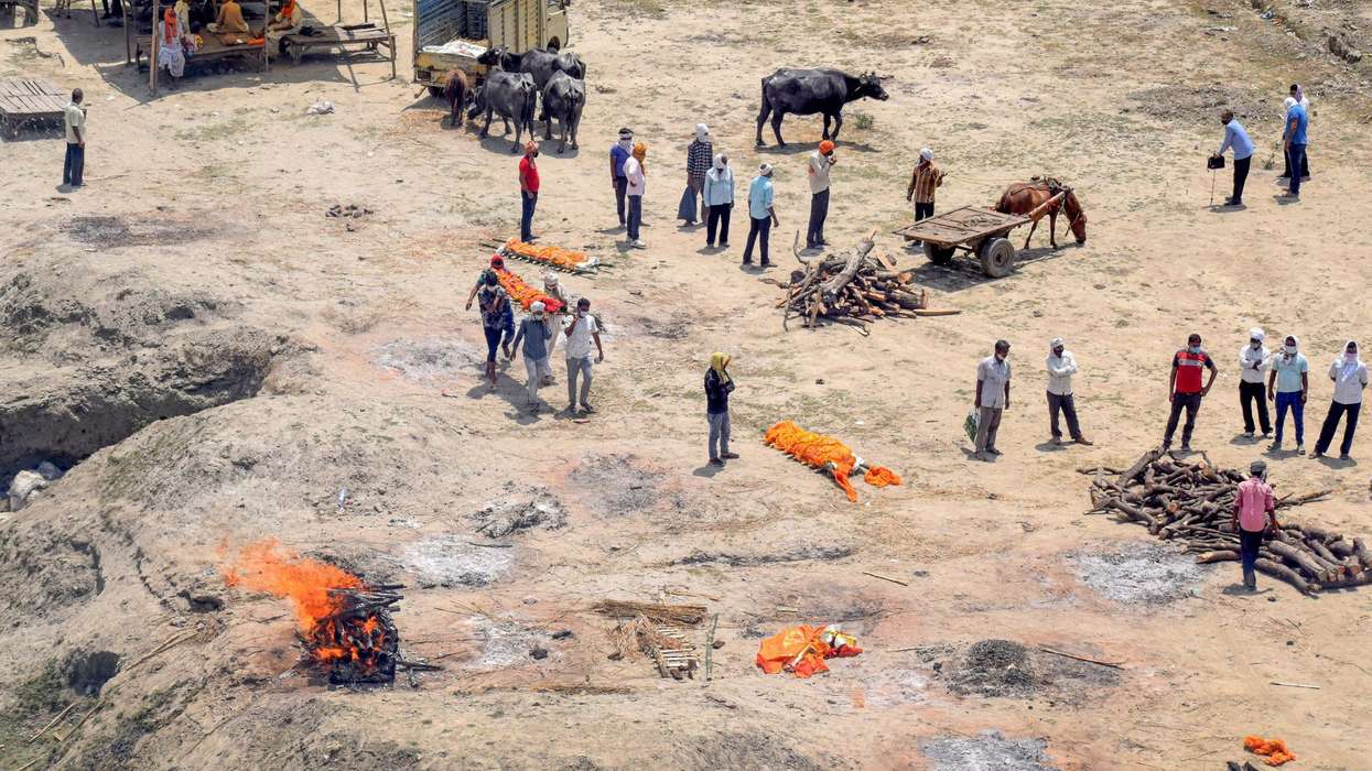India's coronavirus toll tops 200,000 after record surge in cases