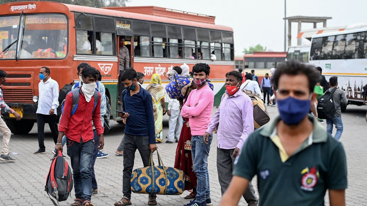 'Life is precious' say Indian migrants fleeing COVID-hit cities