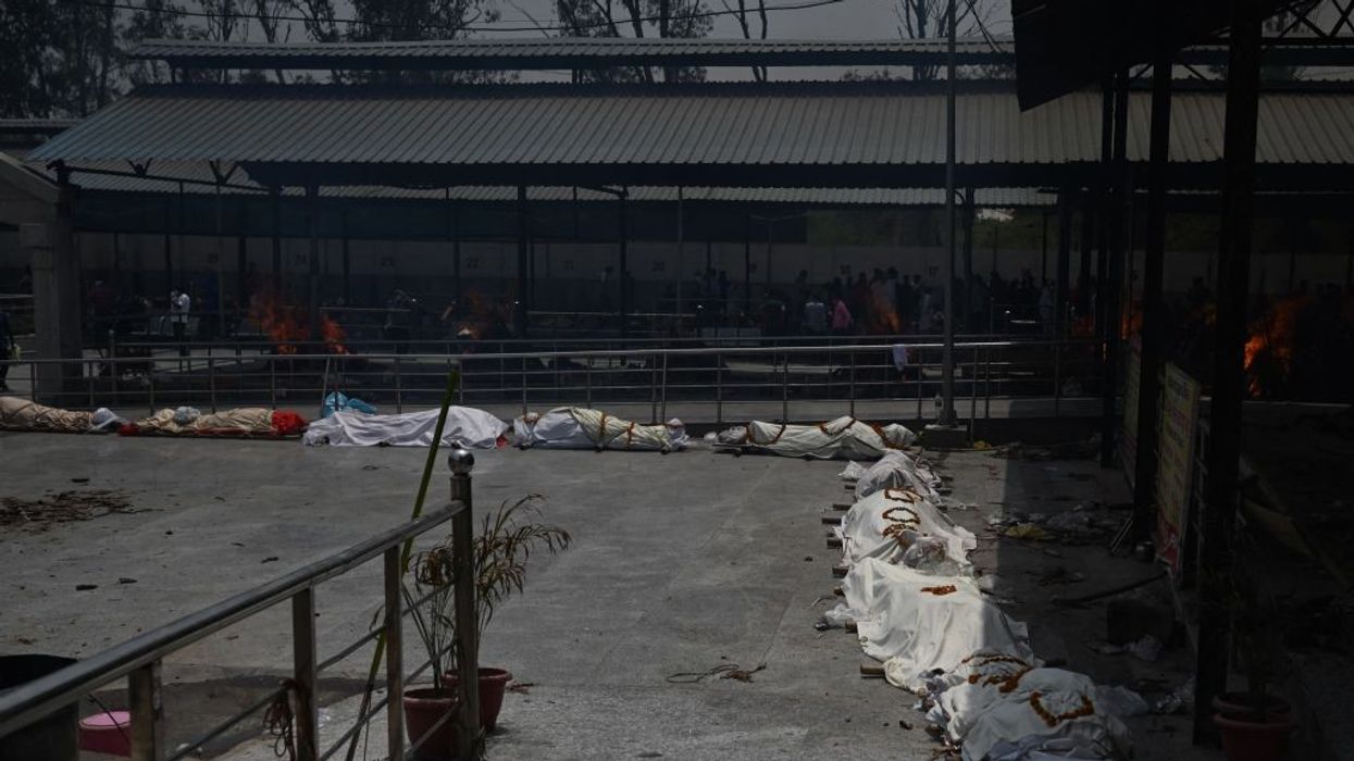 India's new Covid-19 infections near 400,000; record number of daily deaths