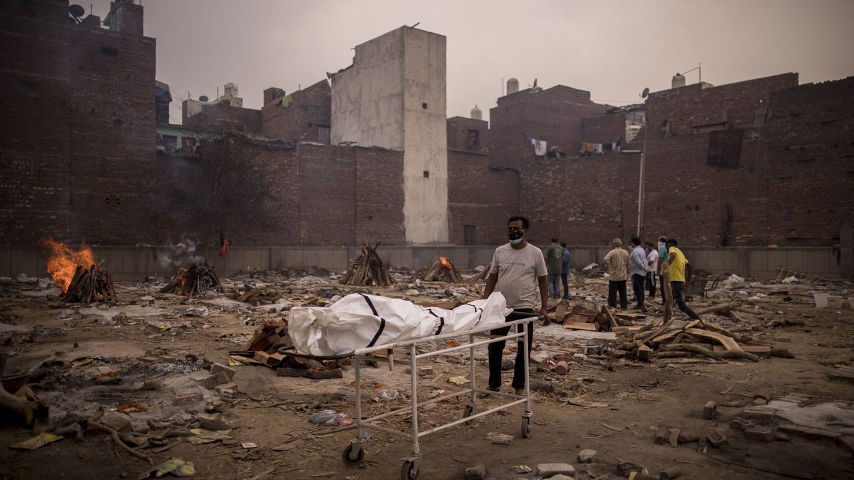 India deaths top 4,000 as Macron urges end to vaccine export limits