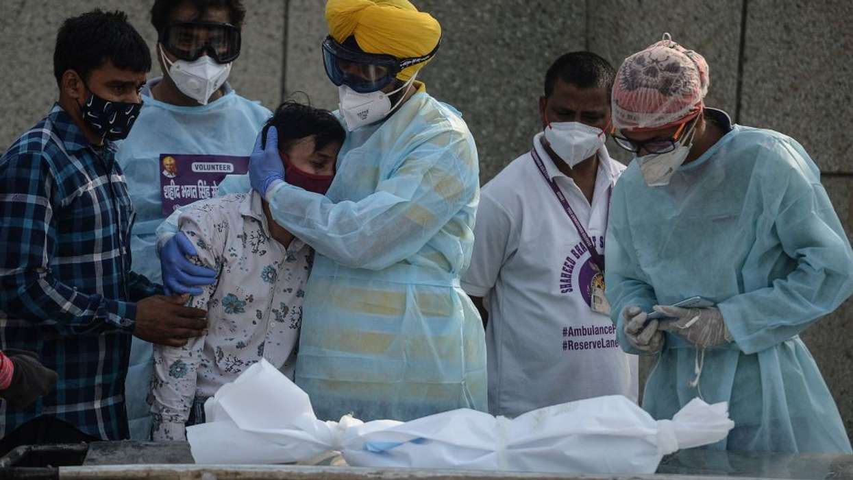 India's interfaith volunteers help farewell Covid victims
