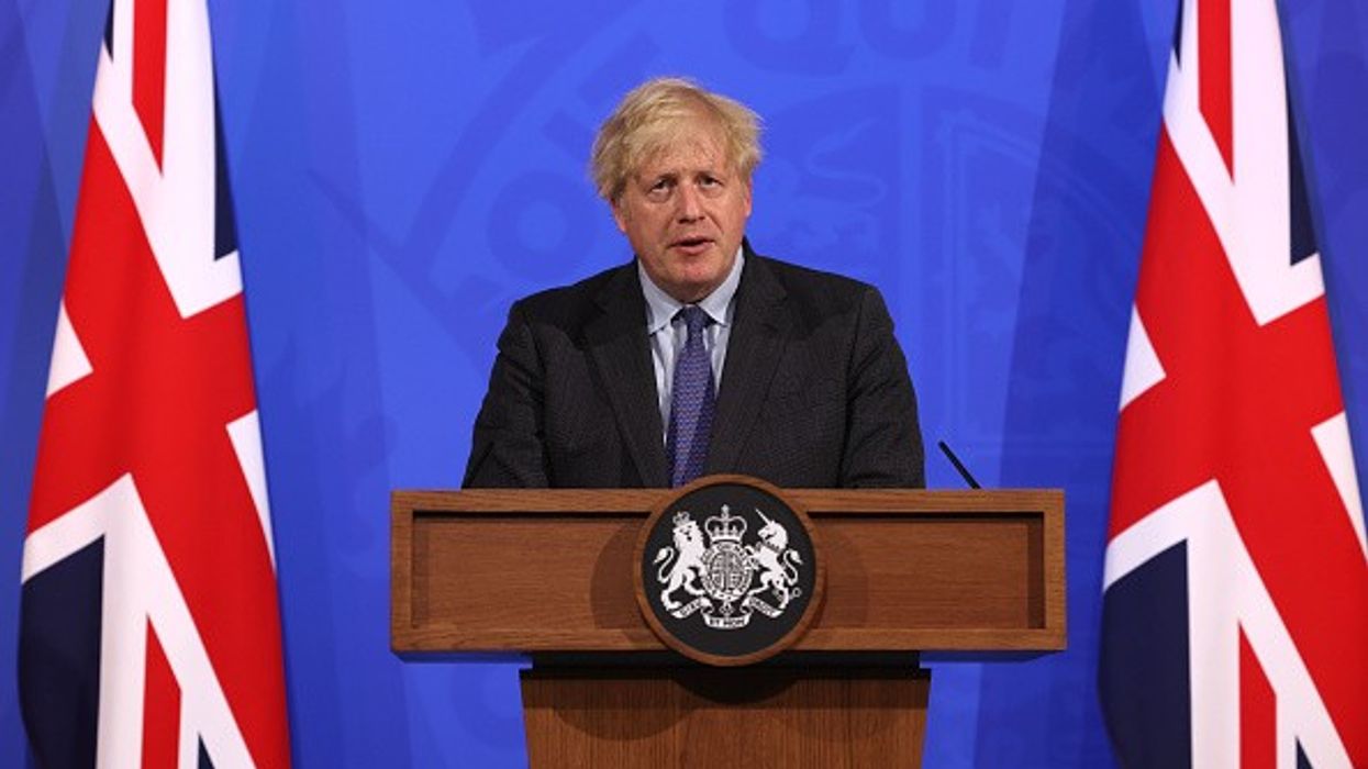 Johnson breaks tax pledge to fund new care for elderly
