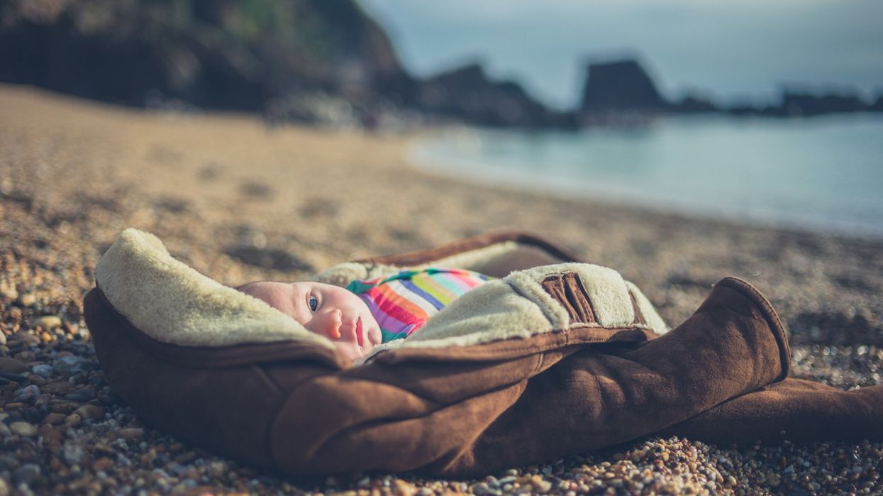 Boatman in India praised for rescuing baby girl floating in a box on the Ganges