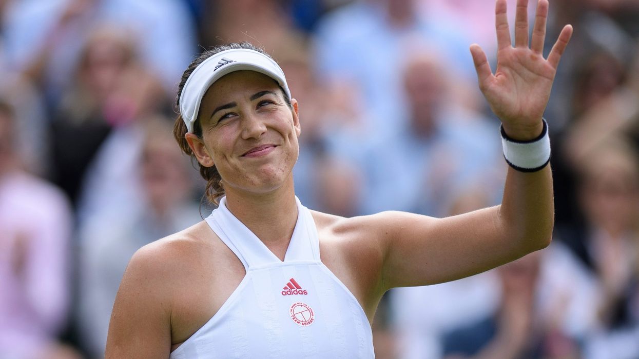 Former champion Muguruza powers into second round