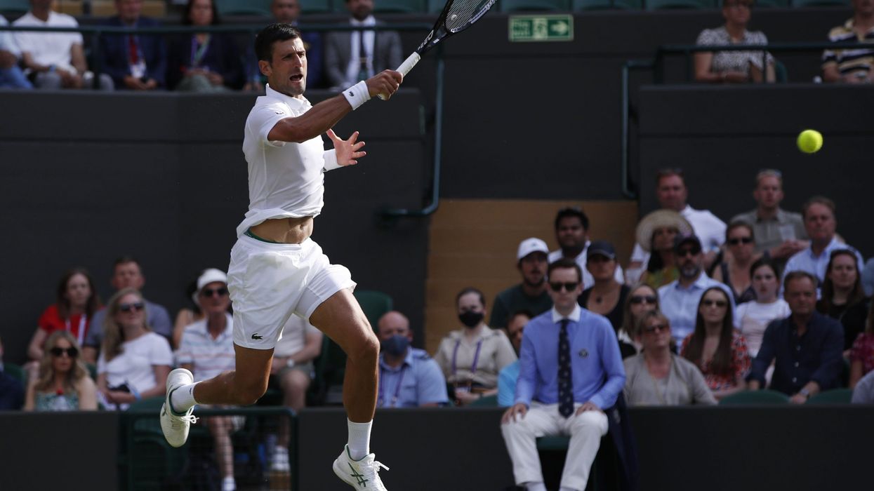 Djokovic into Wimbledon last 16 for 13th time