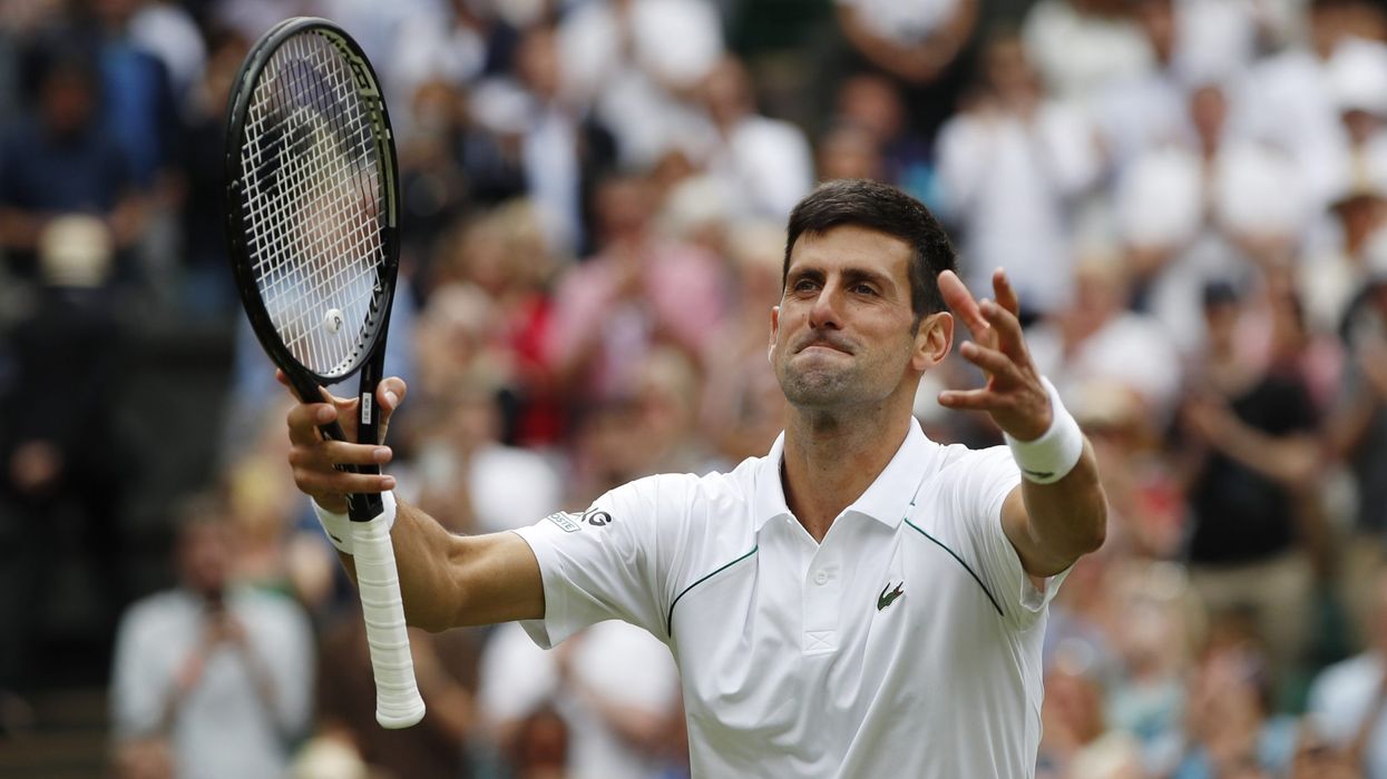 Djokovic into 50th Grand Slam quarterfinal