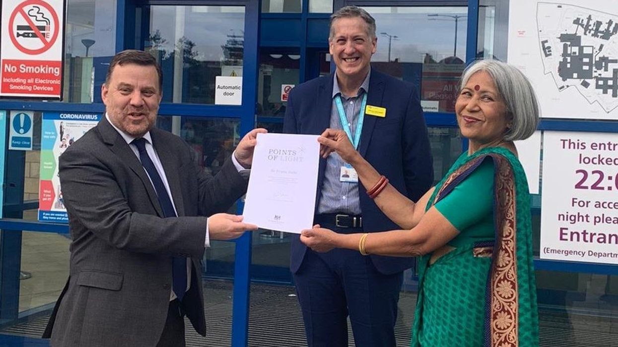 Johnson awards community volunteer in Appleton