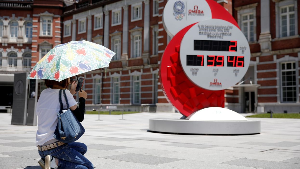 Five rings up in Tokyo sky as competition gets underway