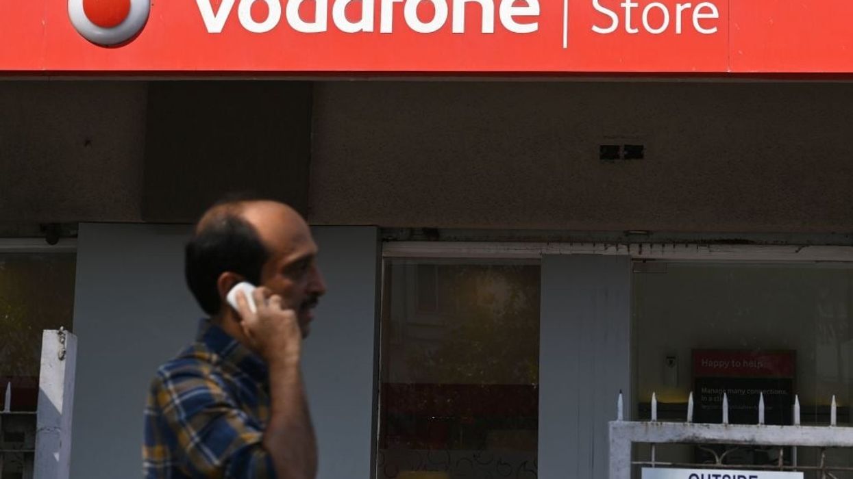 Cost-cutting Vodafone reports sliding revenues