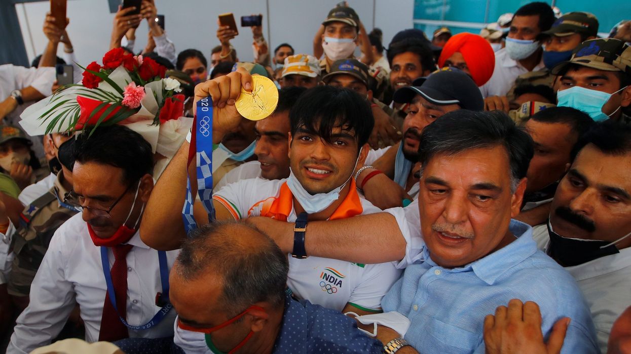 Frenzy, chaos mark return of Indian Olympic contingent