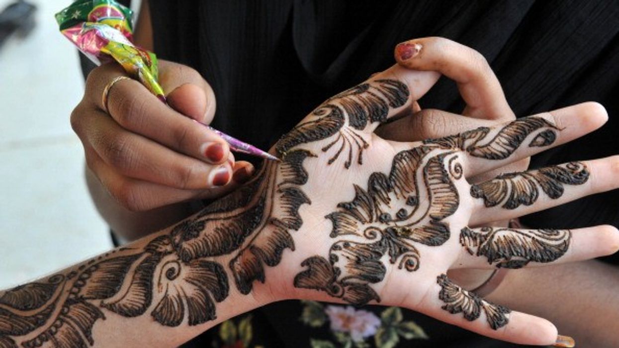 Blackburn teacher creates most henna art world record
