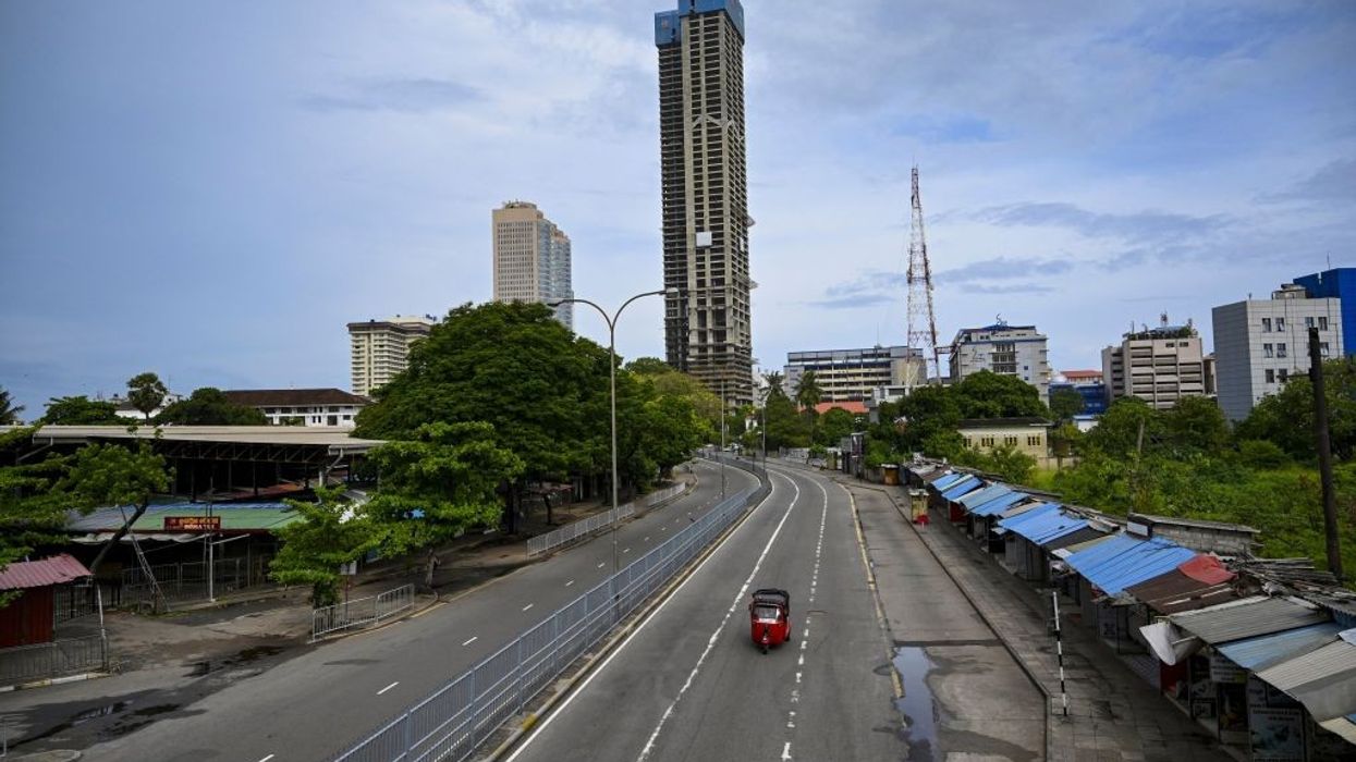 Sri Lanka raises rates as rupee falls to record low