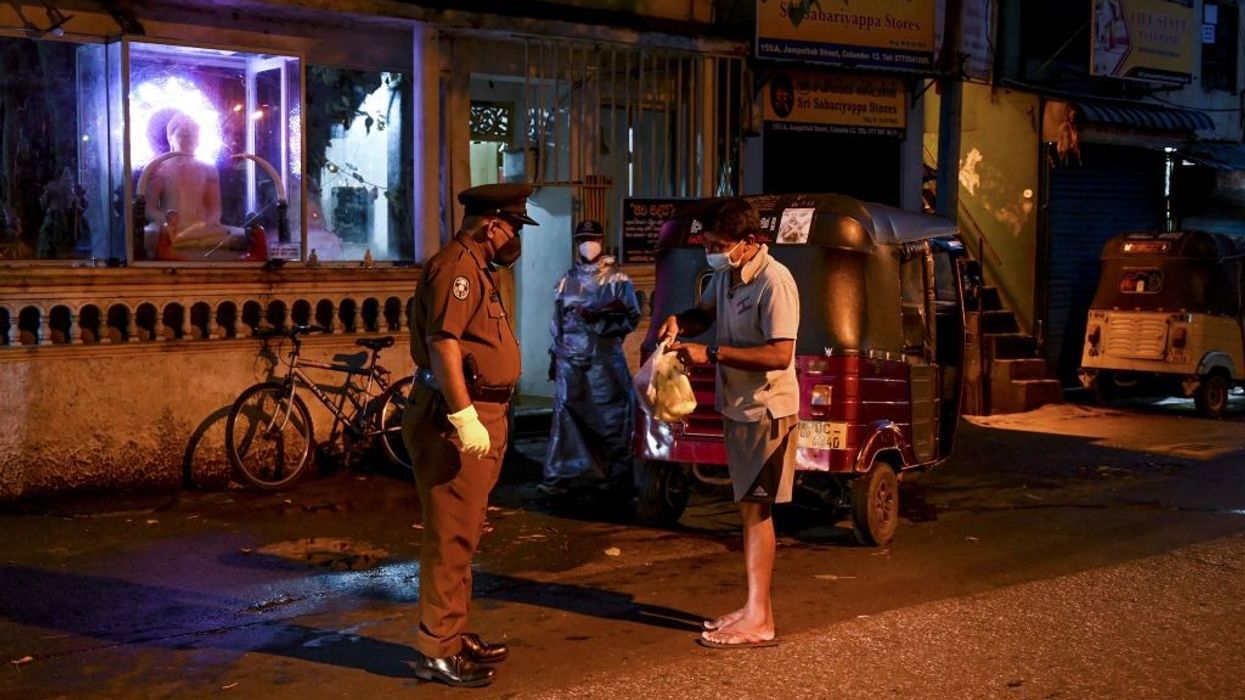 Sri Lanka extends curfew as virus toll hits new record