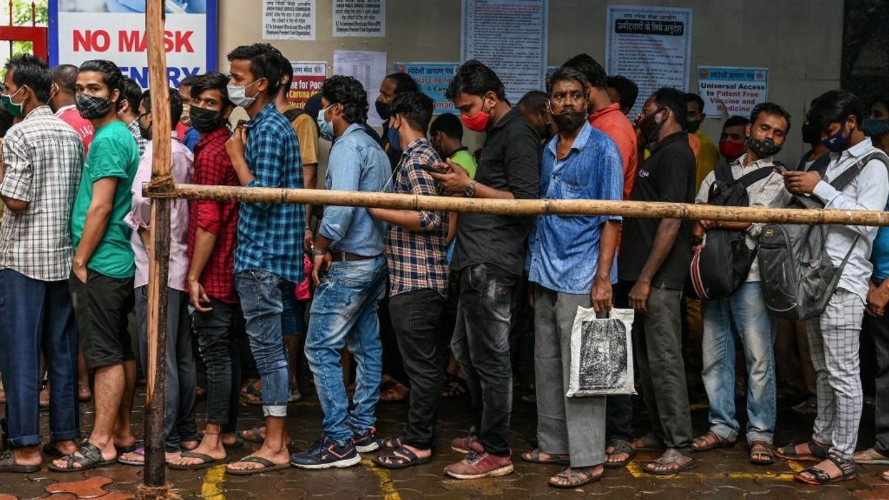 Indian court allows shorter dose gap for those who 'pay' for the vaccine