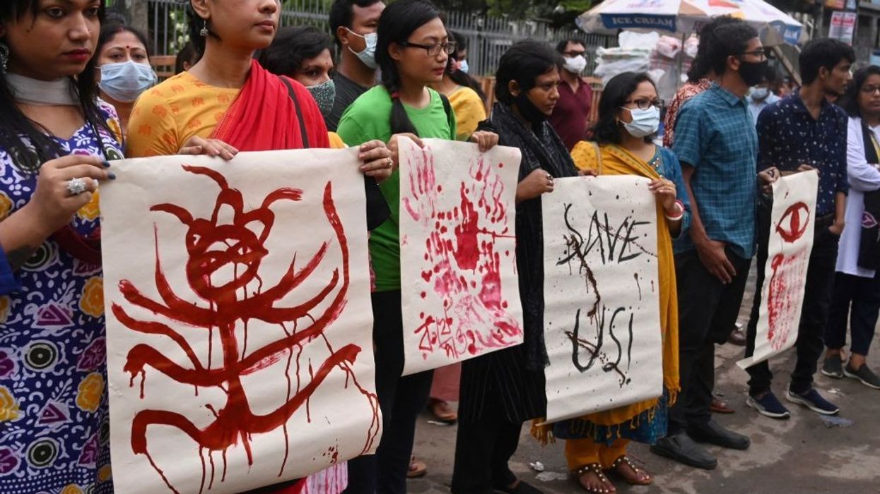 Bangladesh's ruling party rallies for Hindus after deadly clashes