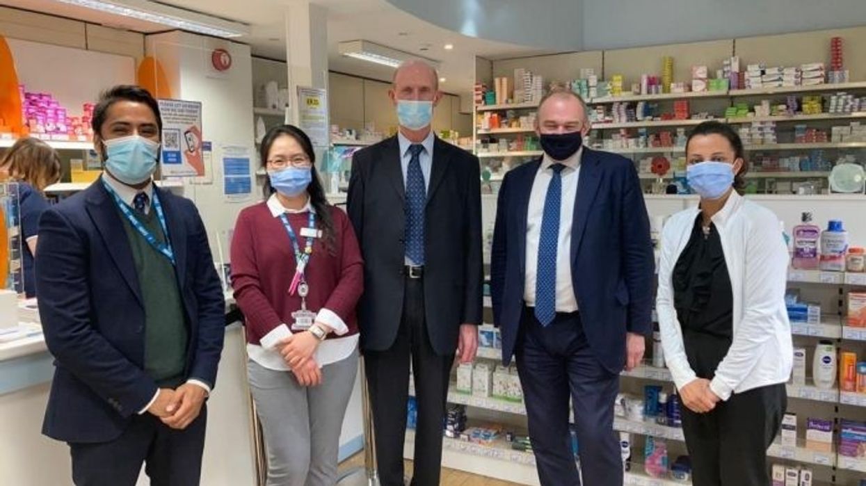 Lib Dem leader Ed Davey visits Day Lewis pharmacy in south London
