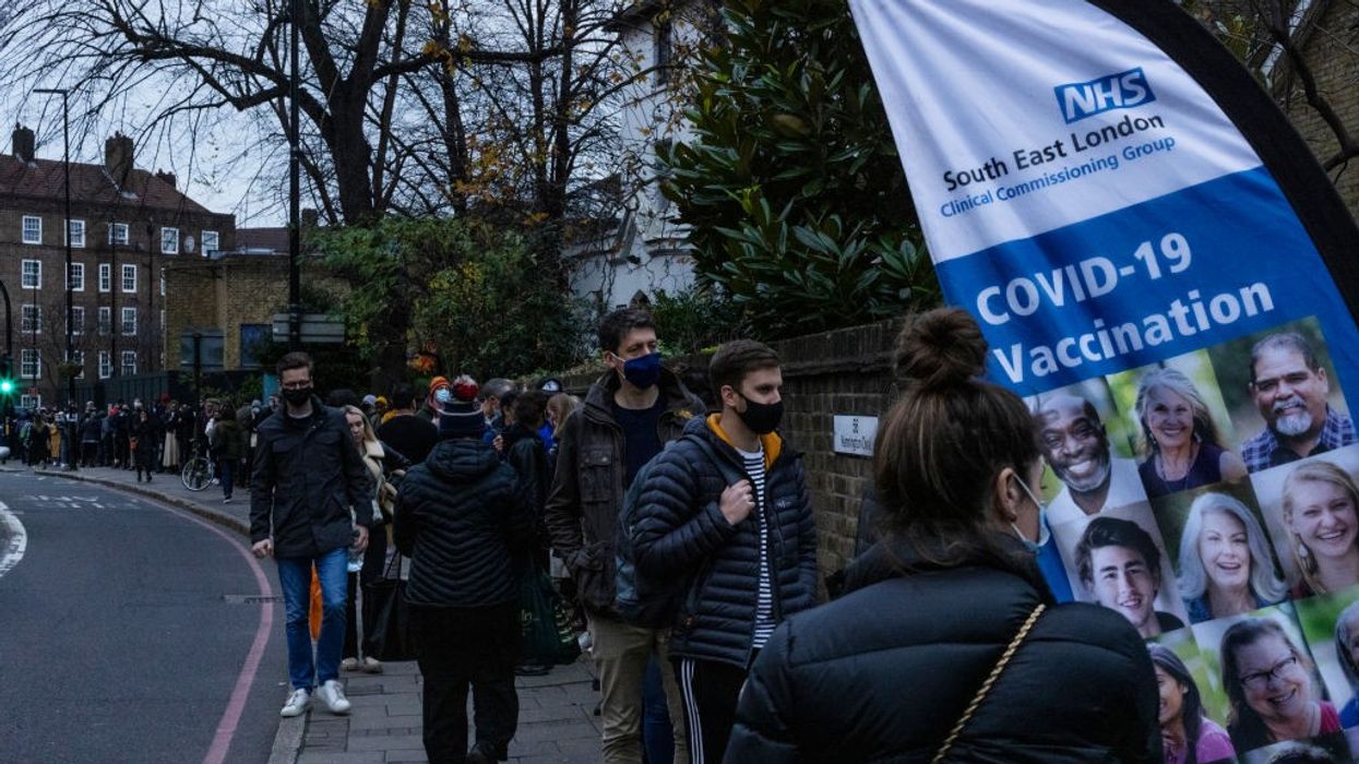 25 million Britons get booster shots as virus continues to surge