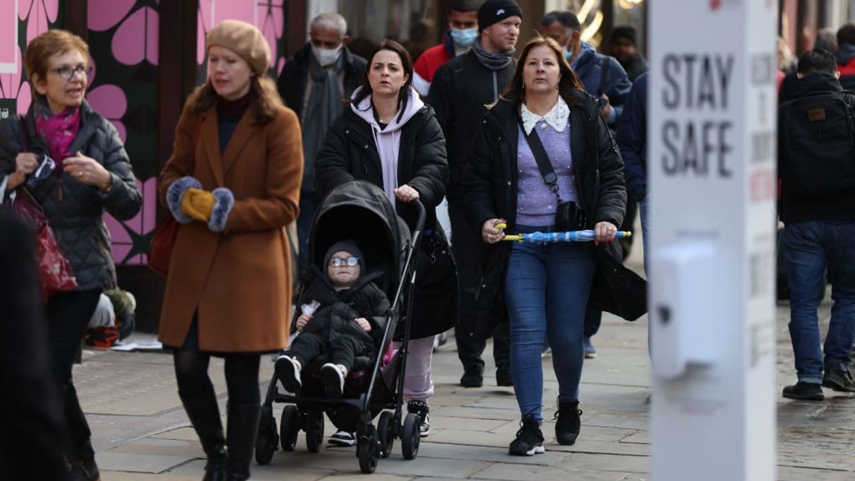 UK's daily Covid infections hit record high of 129,471