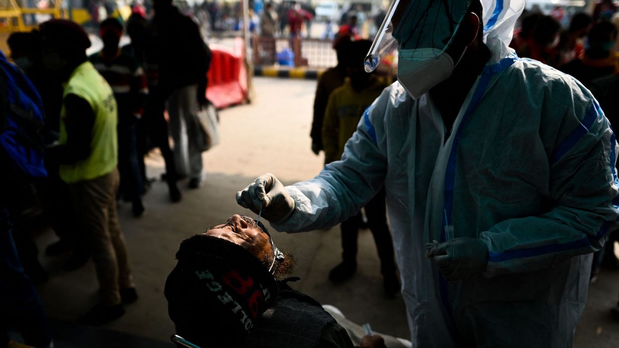 Omicron spreads in India's big cities but hospitalisations still low