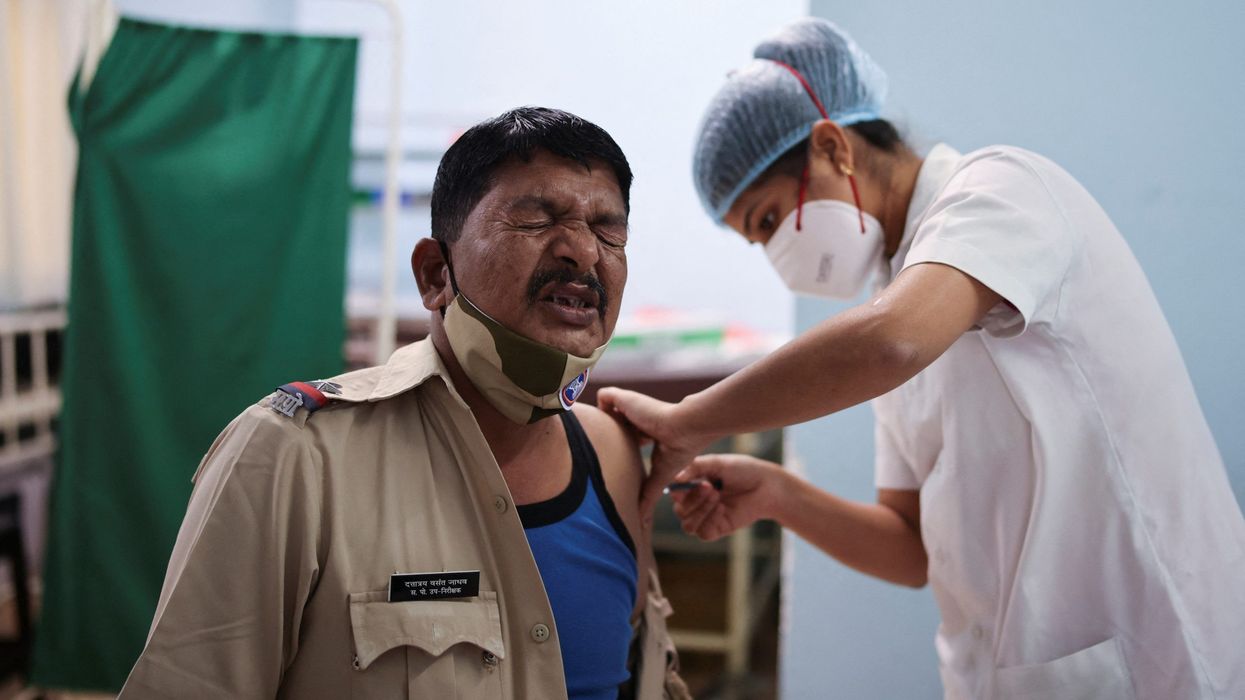 India's Covid cases multiply, vulnerable groups given boosters